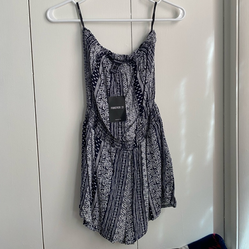 Forever 21 romper. Perfect condition with tags!! Size S
